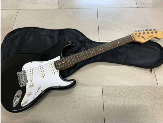 thu mua guitar điện cũ